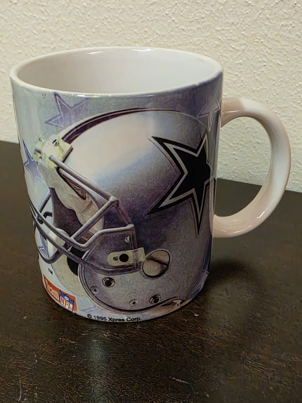 NFL Dallas Cowboys Silver and Blue Ceramic Mug with Helmet Graphic